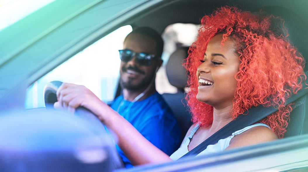 Young gen-z woman buying a car